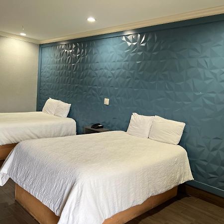 The Symphony Inn & Suites Houston Esterno foto