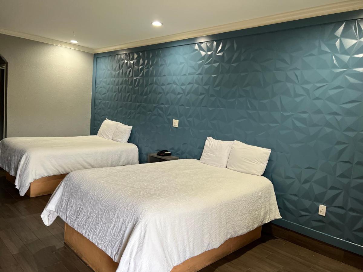 The Symphony Inn & Suites Houston Esterno foto