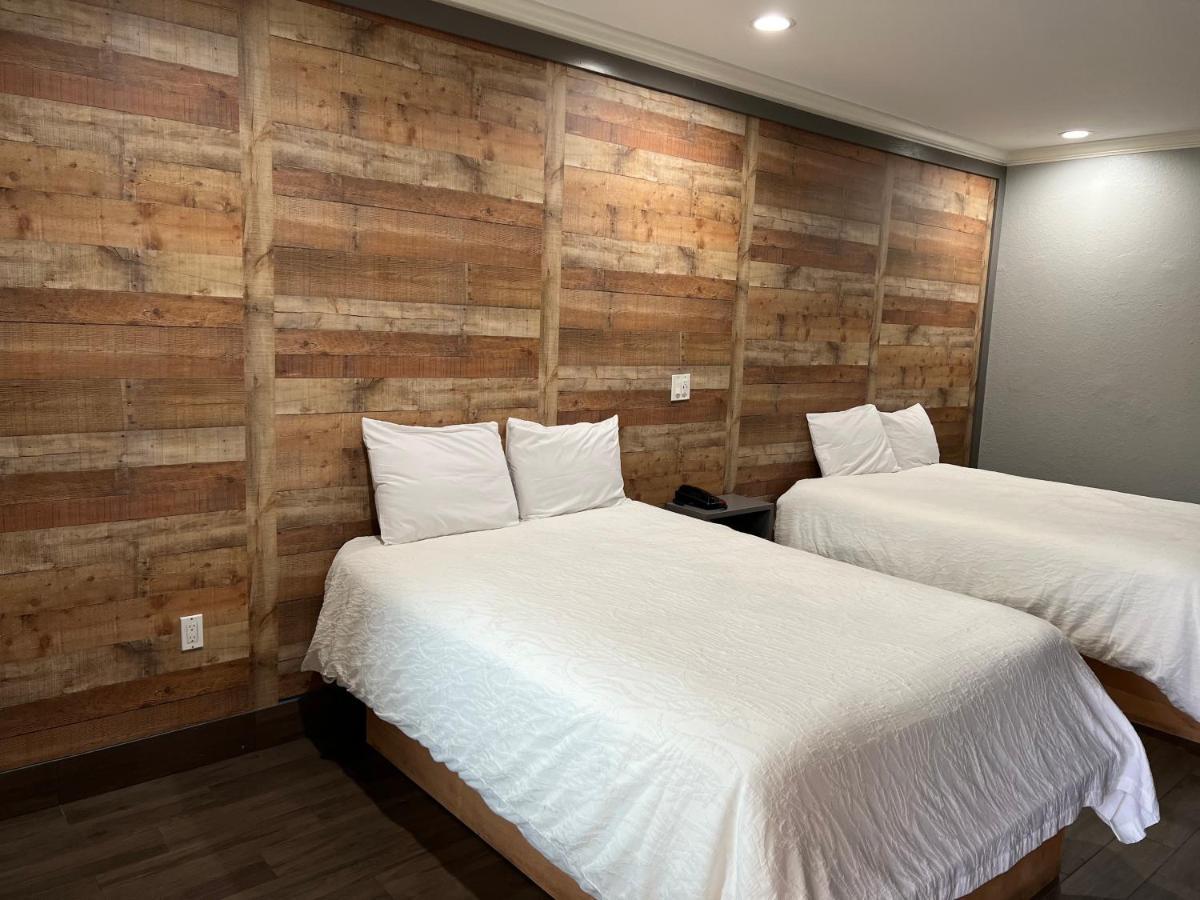 The Symphony Inn & Suites Houston Esterno foto